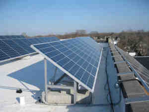 How many solar panels are needed to power a commercial building?
